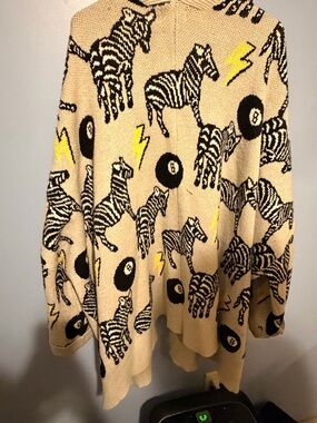 Dressed in lala magic 8 ball/zebra cardi